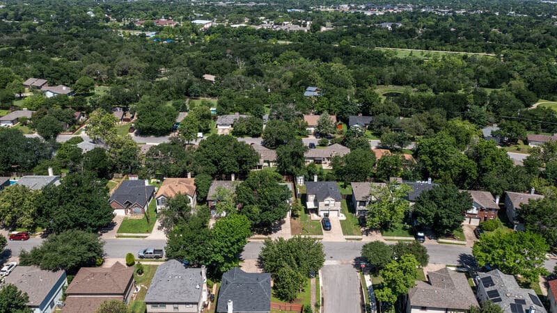 Aerial drone view of home and Greenslopes neighborhood